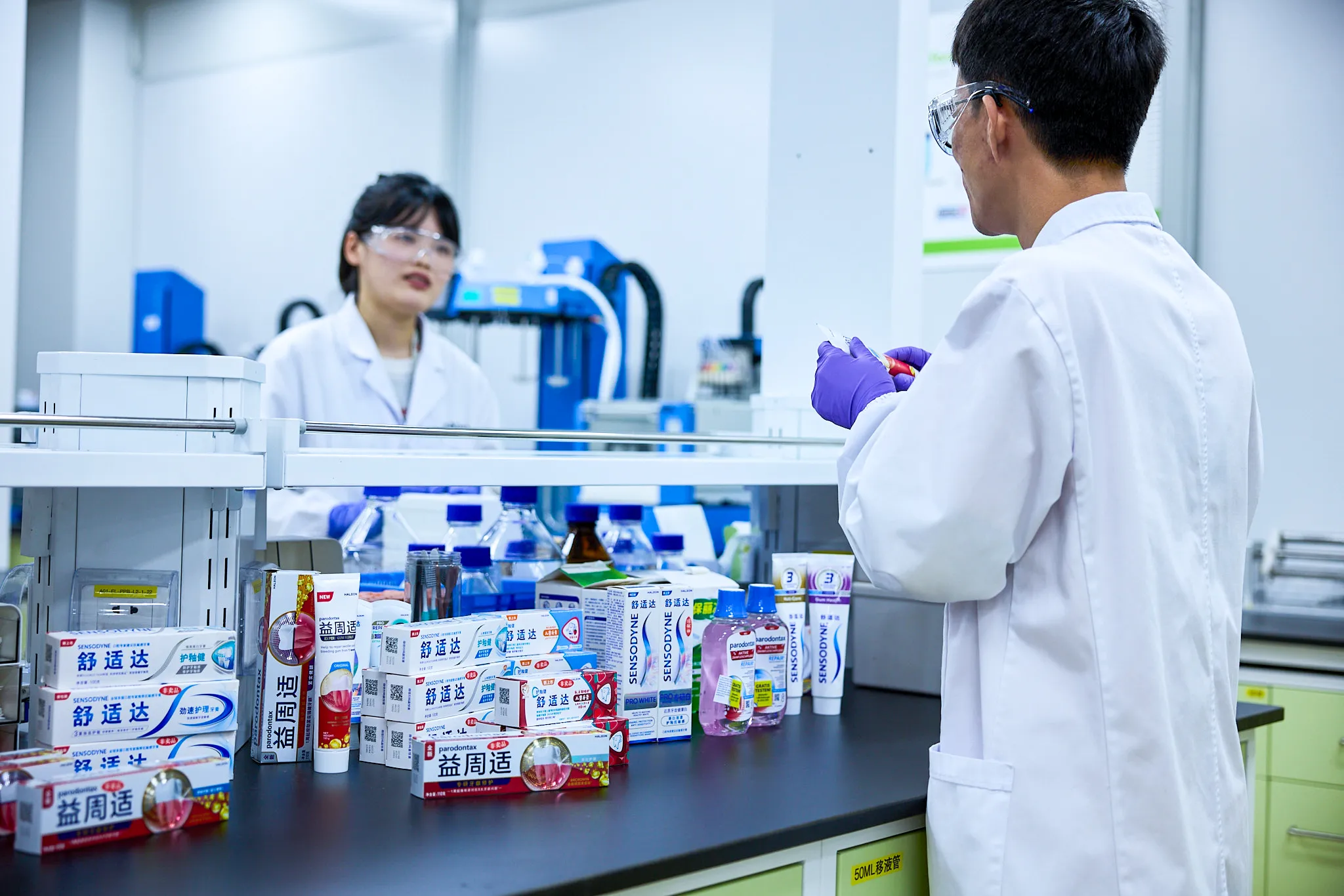 Two Haleon employees at a manufacturing site in China 