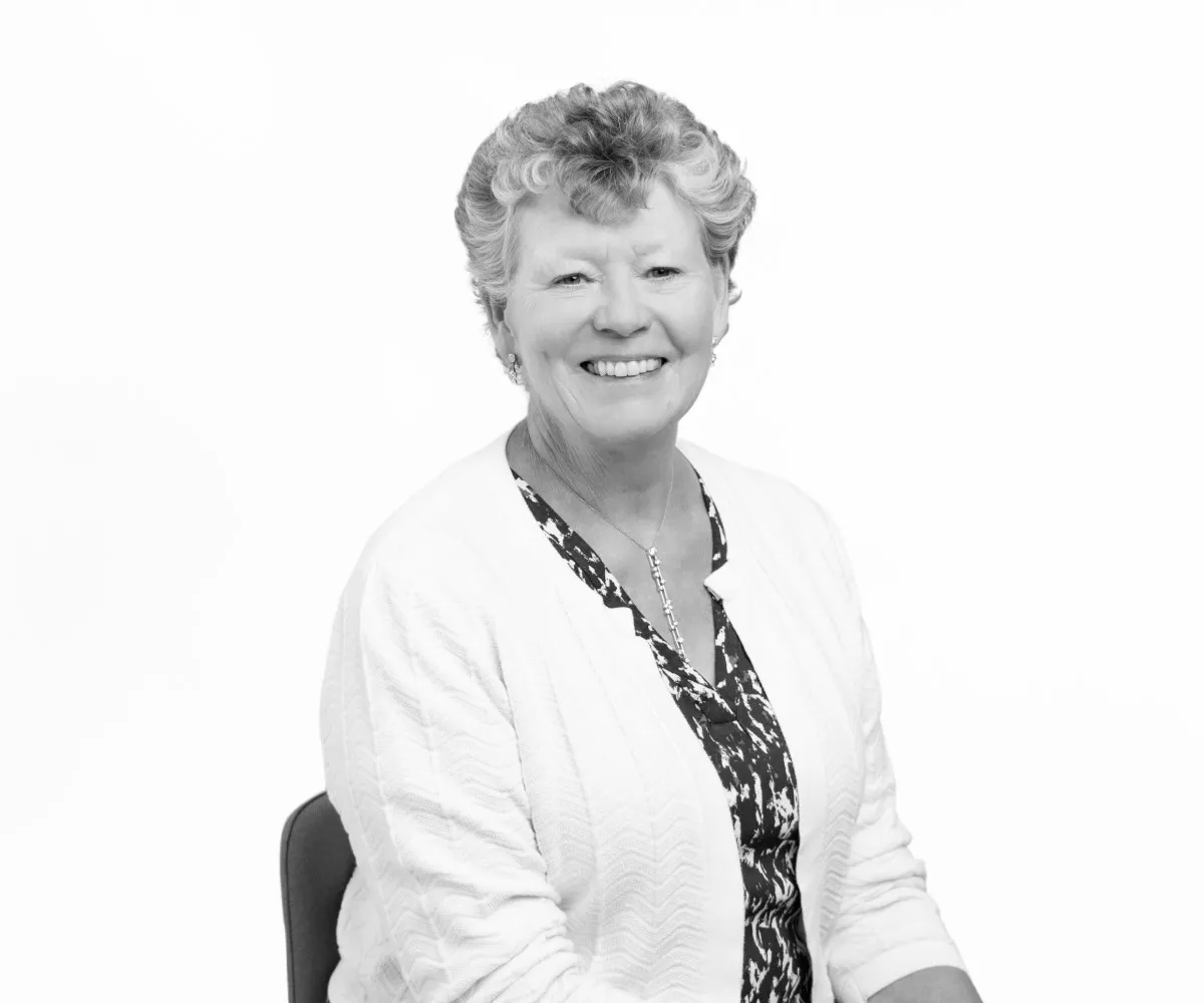 A headshot of Dame Vivienne Cox, the image is in black and white