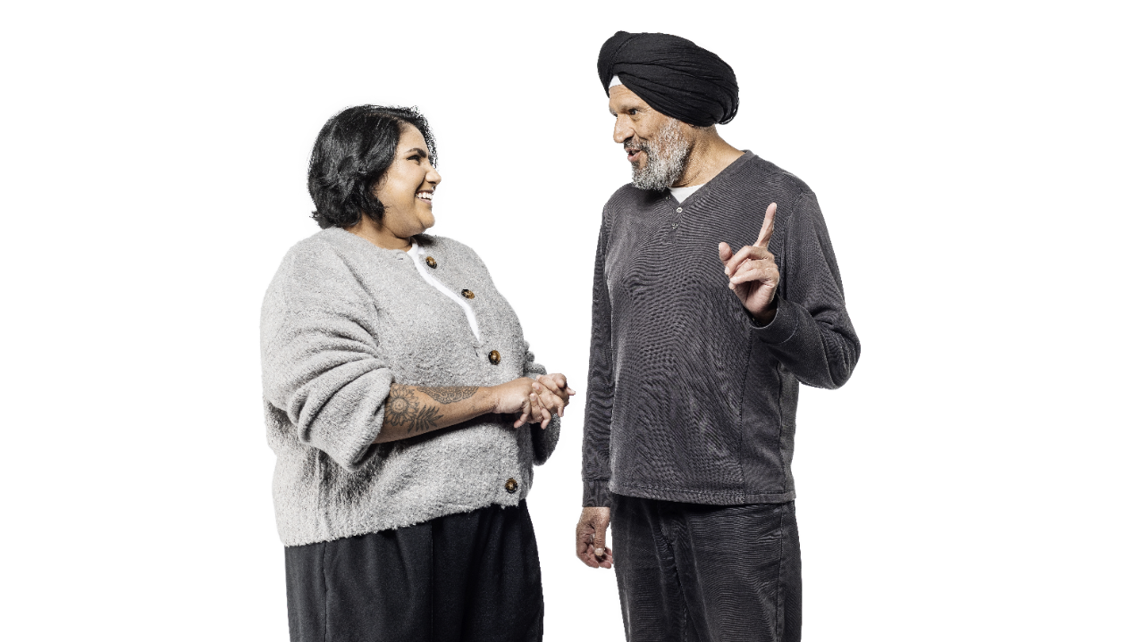 Two people talking and smiling 