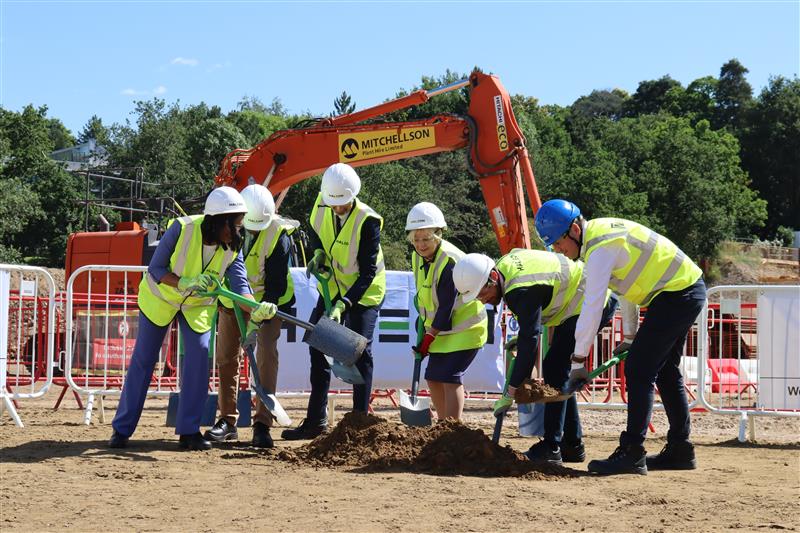 People breaking the ground