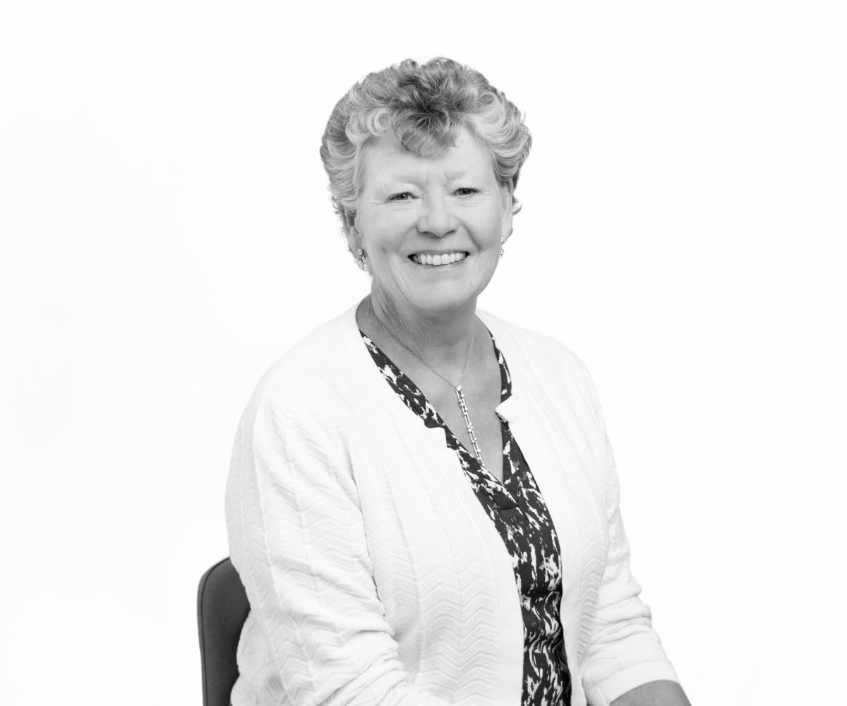 A headshot of Dame Vivienne Cox, the image is in black and white