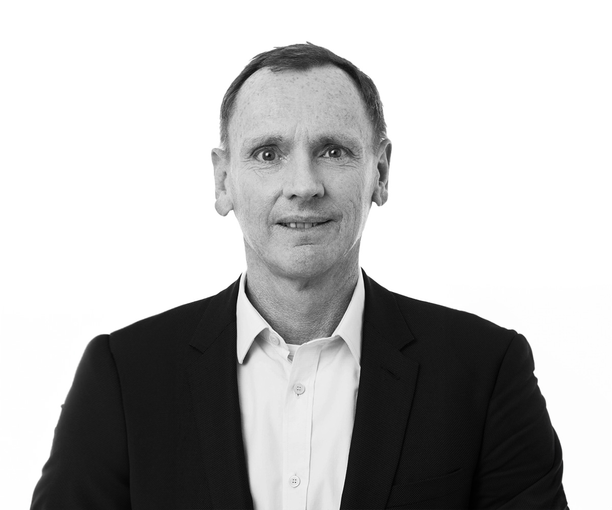 A headshot of Tobias Hestler, the image is in black and white